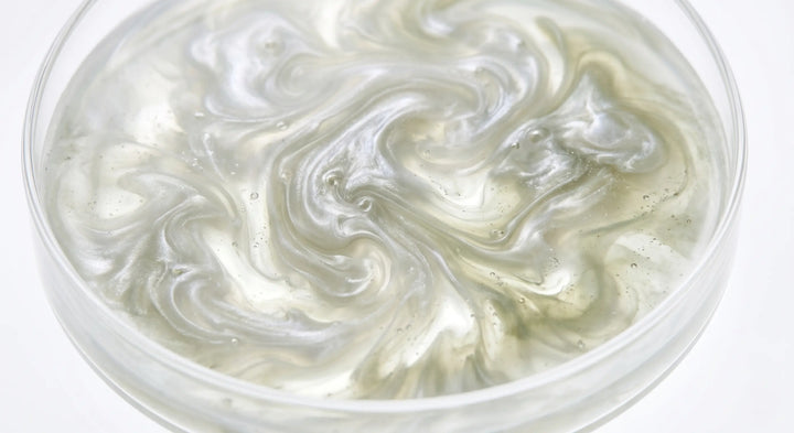 Probiotics: Extreme macro photography of luminous, semi-translucent organic fluid patterns representing a healthy microbiome | RevitaPlus ScienceBits