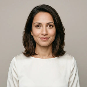 Professional woman in a white top for RevitaPlus wellness support