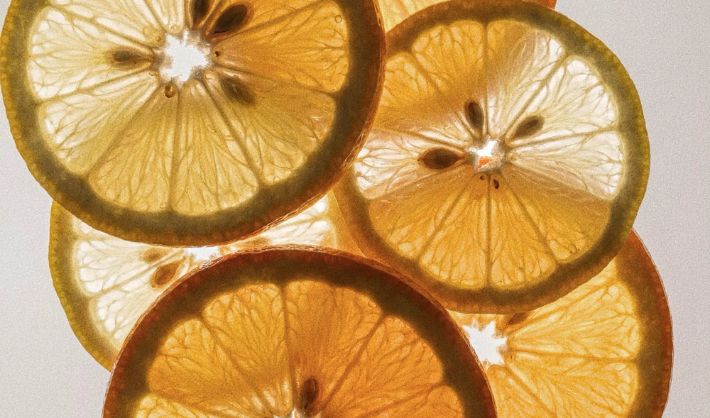 Translucent citrus slices in warm macro detail for a natural wellness ingredient story