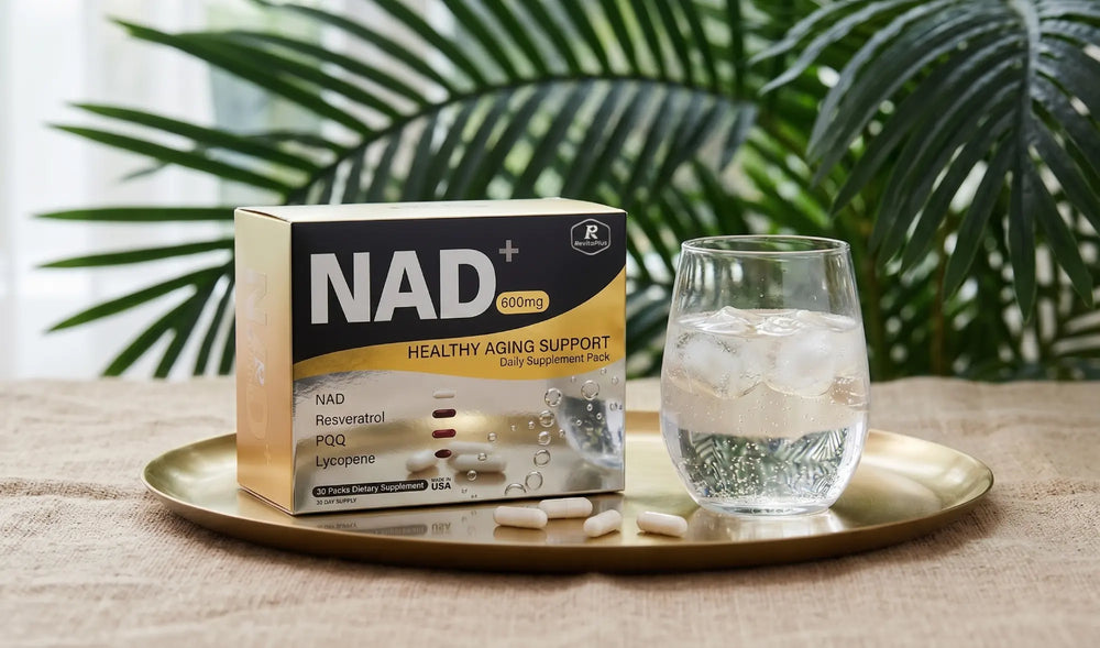 RevitaPlus NAD+ Healthy Aging Support box with water and capsules on a gold tray