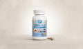 RevitaPlus Stress Calm dietary supplement bottle with veggie capsules on a soft neutral background